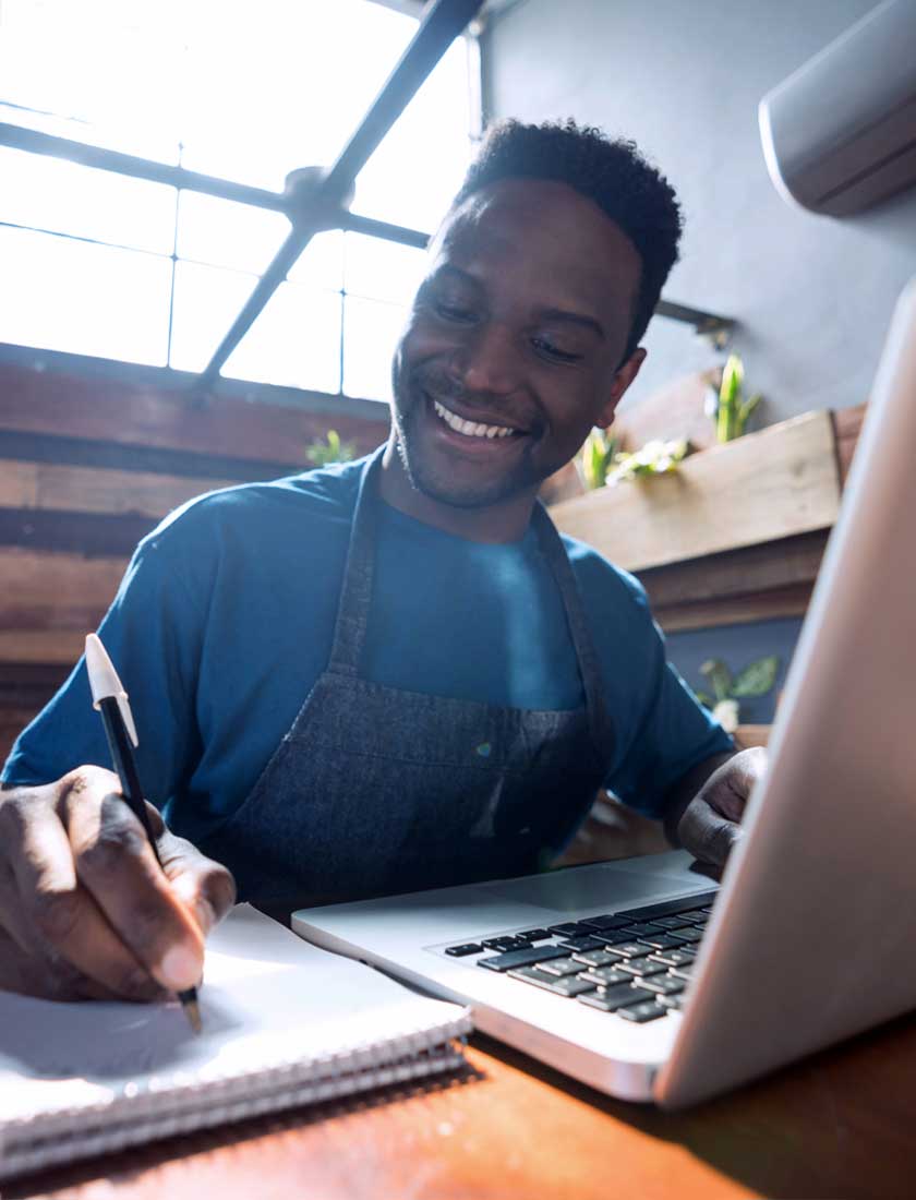 small business employee using business savings account online